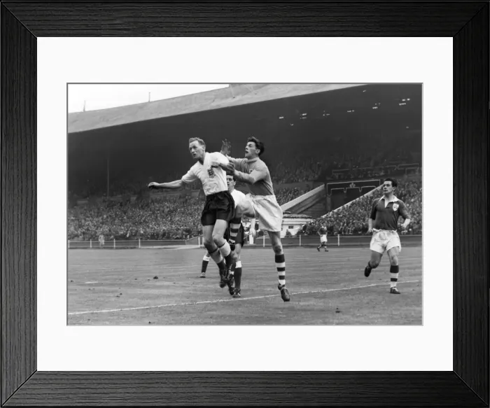 Framed Print : Tom Finney leaps at Wembley against Ireland in 1957 Framed Print : Tom Finney leaps at Wembley against Ireland in 1957