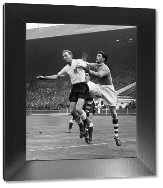 Tom Finney leaps at Wembley against Ireland in 1957
