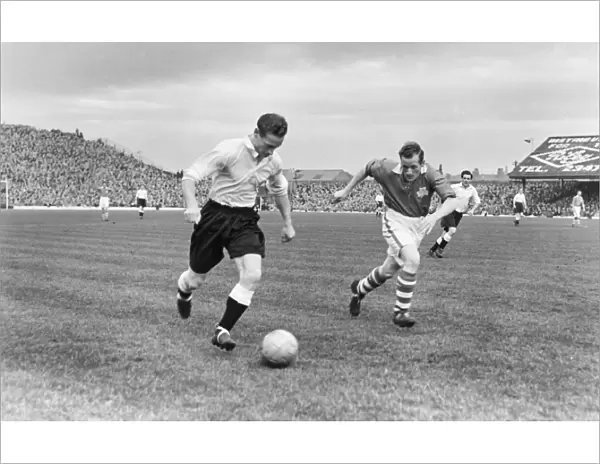 Tom Finney on the ball for the English League at Blackpool in 1950