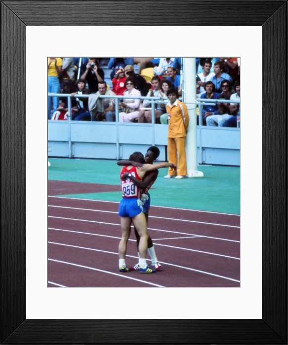Framed Print : Mike Shine (silver) and Ed Moses (gold) congratulate each other after the mens 400m hurdles final at the 1976 Montreal Olympics Framed Print : Mike Shine (silver) and Ed Moses (gold) congratulate each other after the mens 400m hurdles final at the 1976 Montreal Olympics