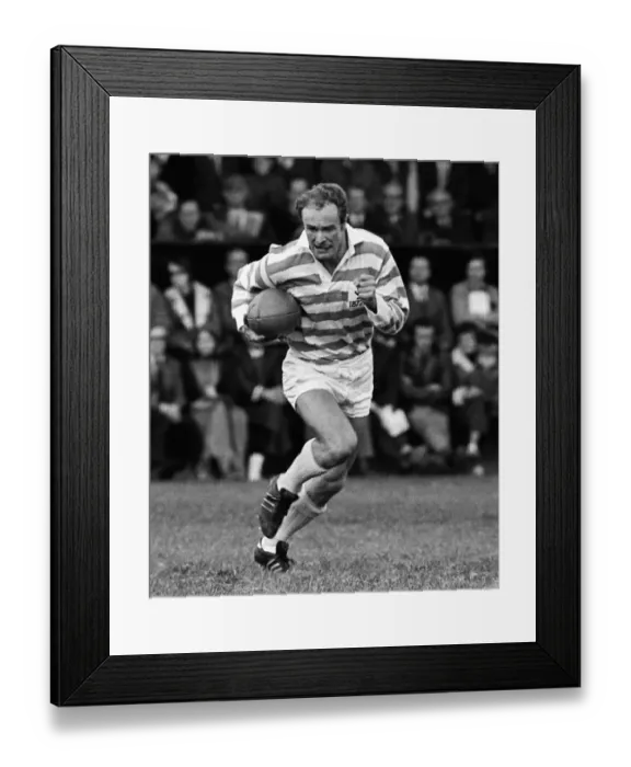 Framed Print : Mike Gibson runs with the ball for a Cambridge University Past and Present side in 1972 Framed Print : Mike Gibson runs with the ball for a Cambridge University Past and Present side in 1972