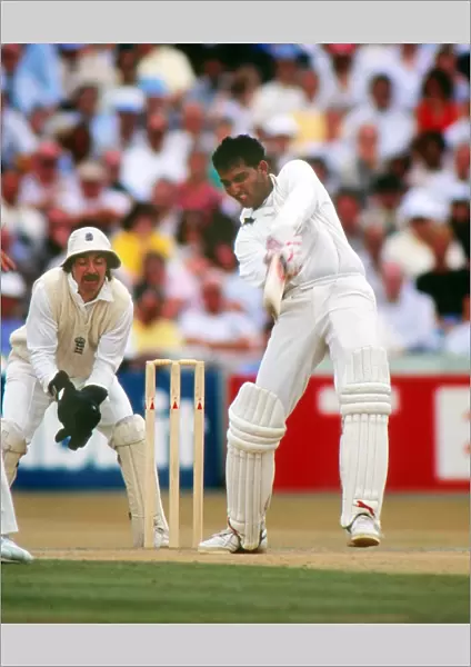 Indias Mohammad Azharuddin on the way to scoring 179 against England in the 2nd Test at Old Trafford in 1990