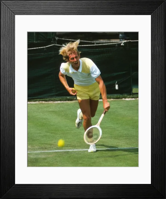 Framed Print : Richard Lewis serves at the 1976 John Player Tournament Framed Print : Richard Lewis serves at the 1976 John Player Tournament