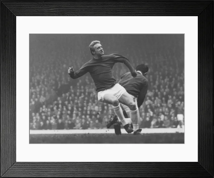Framed Print : Denis Law and Tommy Lawrence Framed Print : Denis Law and Tommy Lawrence