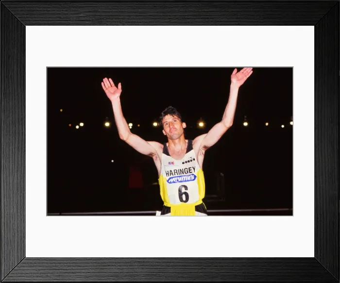 Framed Print : Athletics - McVities meeting at Crystal Palace 1989 - Mens 1500m Sebastian Coe of Great Britain raises his arms to the crowd after running in his last race in the UK before