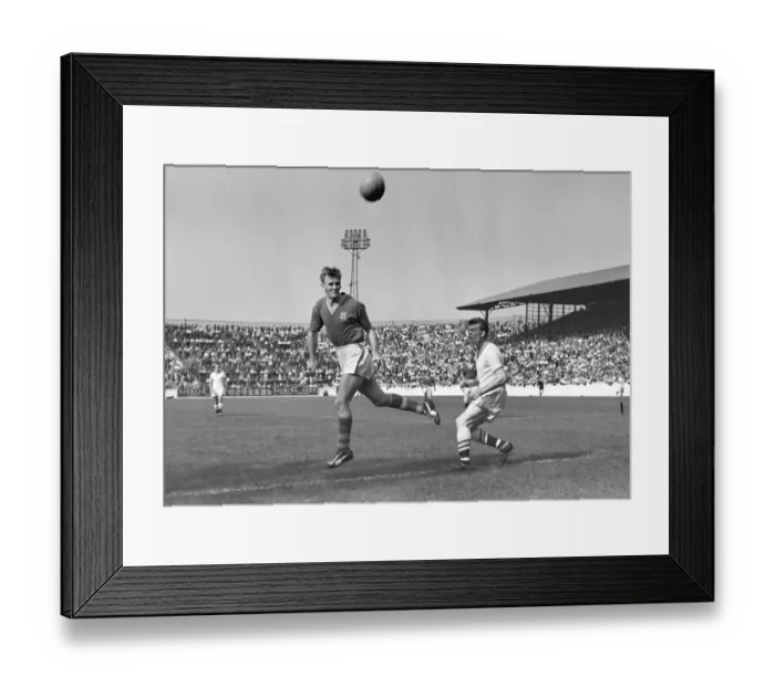 Framed Print : Don Revie heads the ball for Leeds in 1959 / 60 Framed Print : Don Revie heads the ball for Leeds in 1959 / 60
