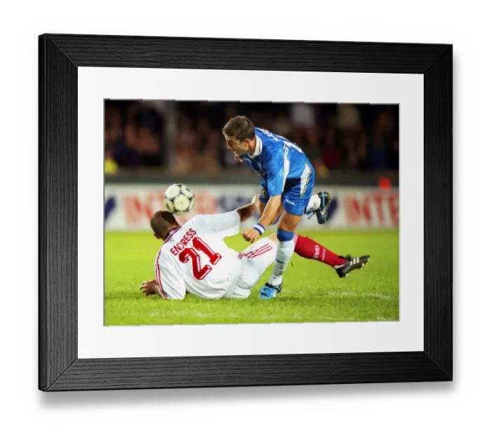 Framed Print : Chelseas Roberto Di Matteo jumps over a tackle from Jochen Endress in the 1998 Cup Winners Cup Final Framed Print : Chelseas Roberto Di Matteo jumps over a tackle from Jochen Endress in the 1998 Cup Winners Cup Final