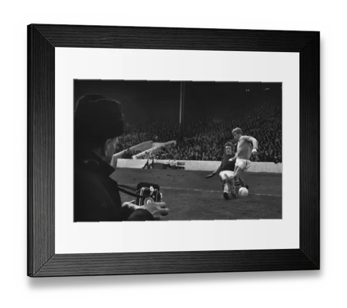 Framed Print : West Hams Billy Bonds tackles Manchester Citys Tony Coleman as a photographer looks on