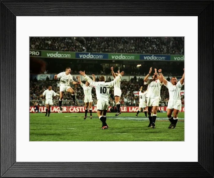 Framed Print : England celebrate at the final whistle after defeating South Africa in 2000 Framed Print : England celebrate at the final whistle after defeating South Africa in 2000