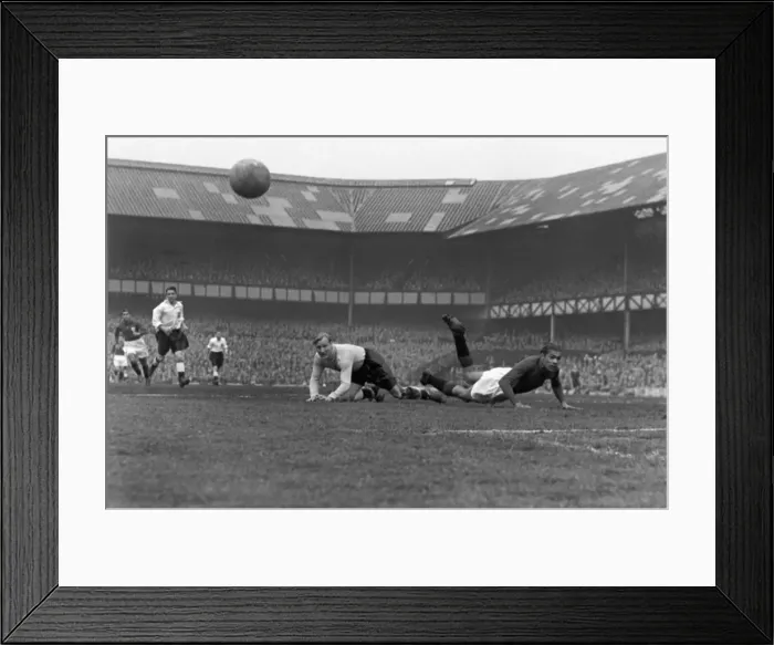 Framed Print : England goakeeper Bert Williams saves against Portugal in 1951 Framed Print : England goakeeper Bert Williams saves against Portugal in 1951