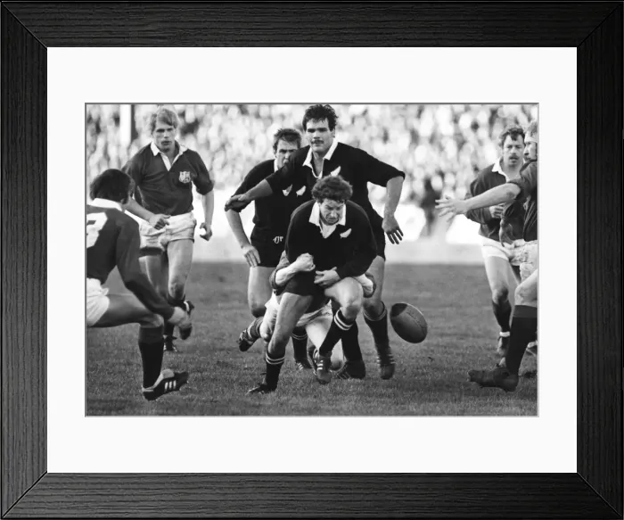 Framed Print : The All Blacks Wayne Smith is tackled during the 2nd Test against the Lions in 1983