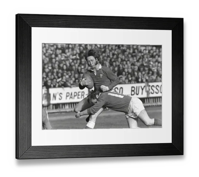 Framed Print : Wales JPR Williams is tackled by Irelands Barry McGann - 1973 Five Nations Framed Print : Wales JPR Williams is tackled by Irelands Barry McGann - 1973 Five Nations