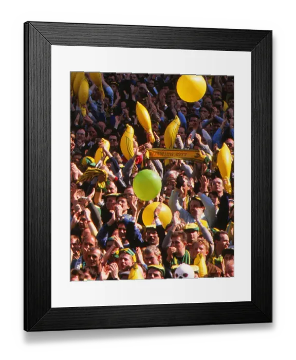 Framed Print : Norwich City fans cheer on their team with balloons and canary inflatables during the 1989 FA Cup Framed Print : Norwich City fans cheer on their team with balloons and canary inflatables during the 1989 FA Cup