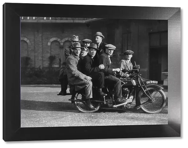 Aston Villa players on the back of Cyril Spiers motor cycle in the grounds of Villa Park in 1923  /  4