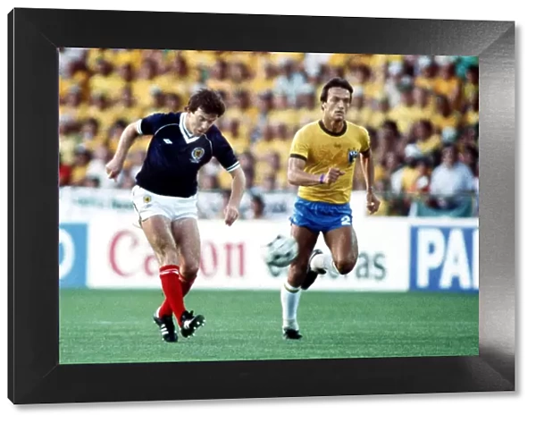 Scotlands John Robertson and Brazils Leandro at the 1982 World Cup