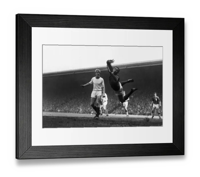 Framed Print : LArsenal goalkeeper James Jim Furnell dives for the ball as teammate Ian Ure looks on in 1964