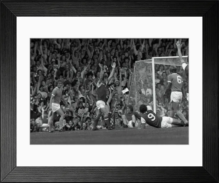 Framed Print : Arsenals Brian Kidd celebrates a goal in front of the North Bank Framed Print : Arsenals Brian Kidd celebrates a goal in front of the North Bank