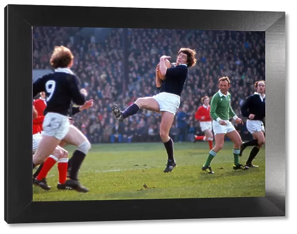 Scotlands Andy Irvine gathers a high ball - 1977 Five Nations