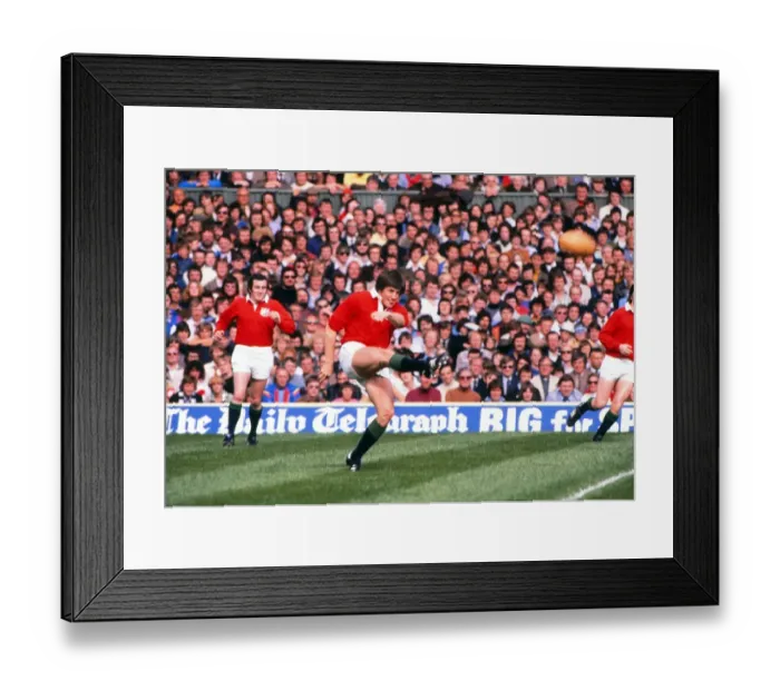 Framed Print : Andy Irvine kicks for the British Lions against the Barbarians in 1977 Framed Print : Andy Irvine kicks for the British Lions against the Barbarians in 1977