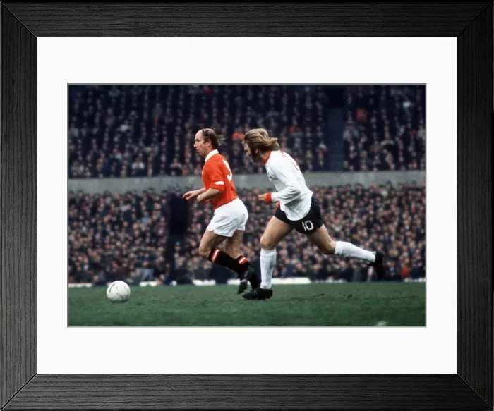 Framed Print : Bobby Charlton on the ball during his last home game for Manchester United Framed Print : Bobby Charlton on the ball during his last home game for Manchester United