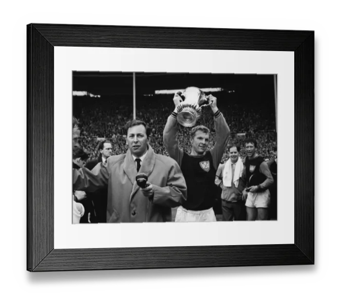 Framed Print : West Ham captain Bobby Moore lifts the FA Cup next to David Coleman in 1964 Framed Print : West Ham captain Bobby Moore lifts the FA Cup next to David Coleman in 1964