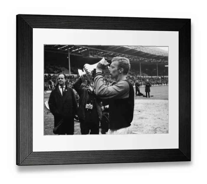Framed Print : West Ham captain Bobby Moore drinks out of the FA Cup after victory in 1964 Framed Print : West Ham captain Bobby Moore drinks out of the FA Cup after victory in 1964