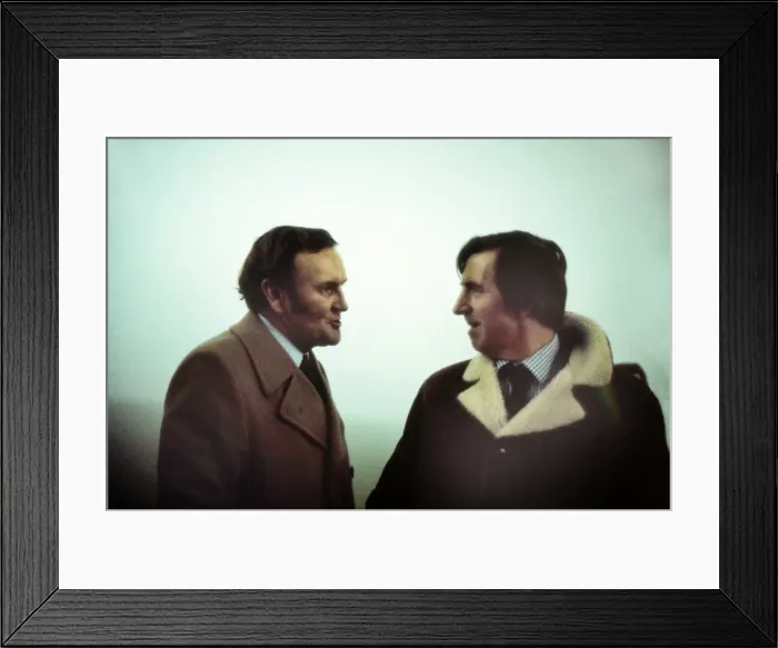 Framed Print : England manager Don Revie and FA Secretary Ted Coker in the fog during the abandoned game against Czechoslovakia in 1975 Framed Print : England manager Don Revie and FA Secretary Ted Coker in the fog during the abandoned game against Czechoslovakia in 1975