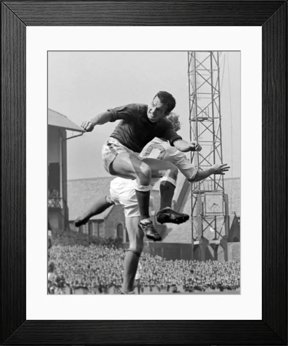 Framed Print : Evertons Alex Parker out-jumps Manchester Uniteds Denis Law - 1963 Charity Shield Framed Print : Evertons Alex Parker out-jumps Manchester Uniteds Denis Law - 1963 Charity Shield