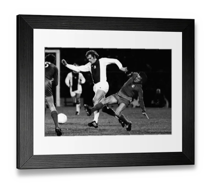 Framed Print : Real Madrids Jose Luis tackles Ajaxs Piet Keizer