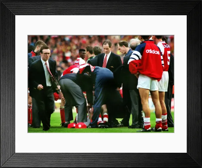 Framed Print : Steve Morrow lies injured after being dropped by Tony Adams during their 1993 League Cup celebrations Framed Print : Steve Morrow lies injured after being dropped by Tony Adams during their 1993 League Cup celebrations