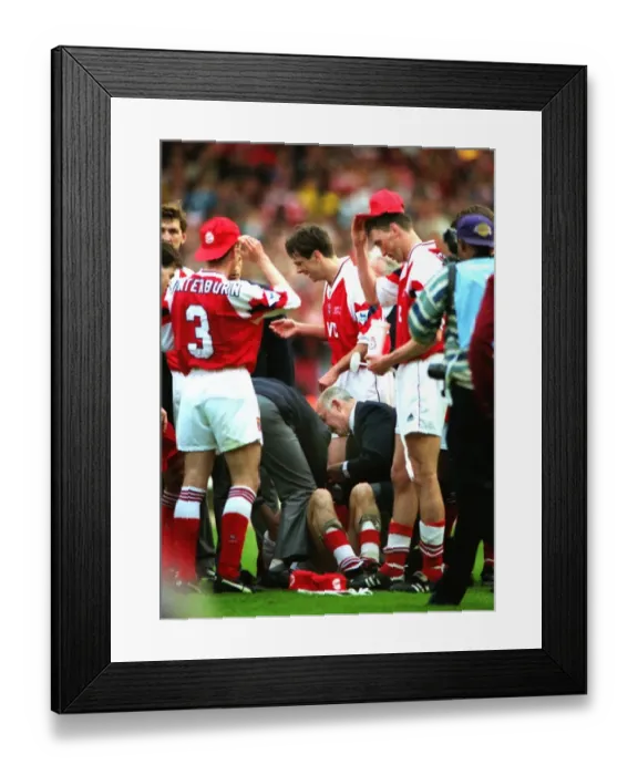 Framed Print : Steve Morrow lies injured after being dropped by Tony Adams during their 1993 League Cup celebrations