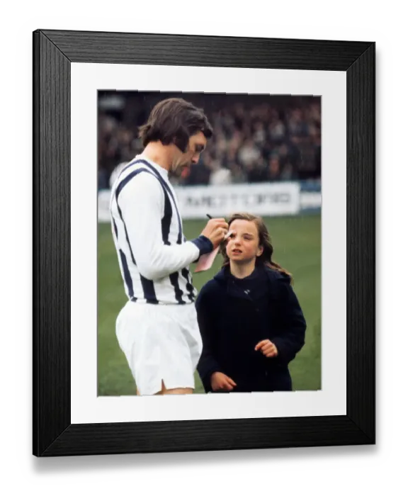 Framed Print : Jeff Astle signs an autograph for a young West Bromwich Albion fan Framed Print : Jeff Astle signs an autograph for a young West Bromwich Albion fan