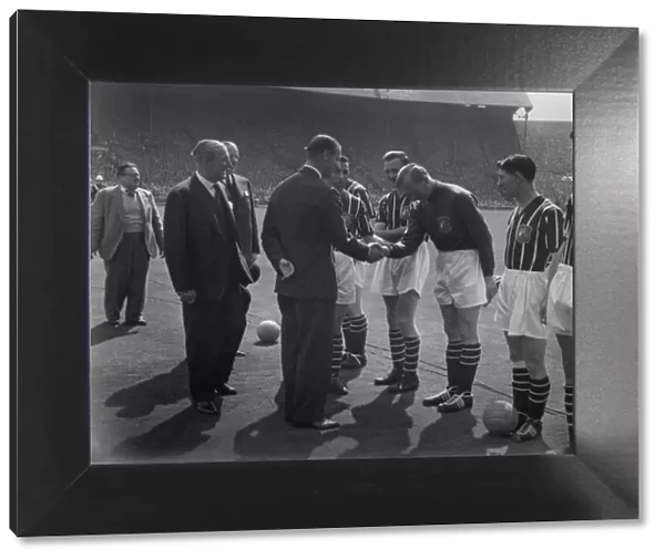 Manchester City goalkeeper Bert Trautmann shakes hands with Prince Philip - 1956 FA Cup Final