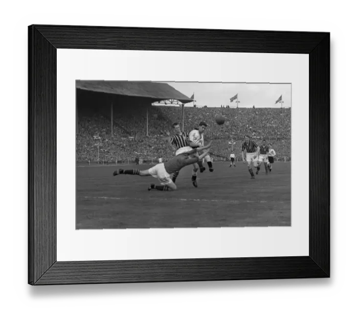 Framed Print : Manchester City goalkeeper Bert Trautmann makes a save - 1956 FA Cup Final