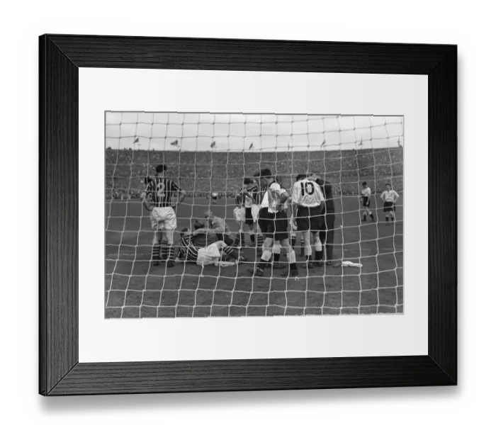 Framed Print : Manchester City goalkeeper Bert Trautmann lies injured - 1956 FA Cup Final