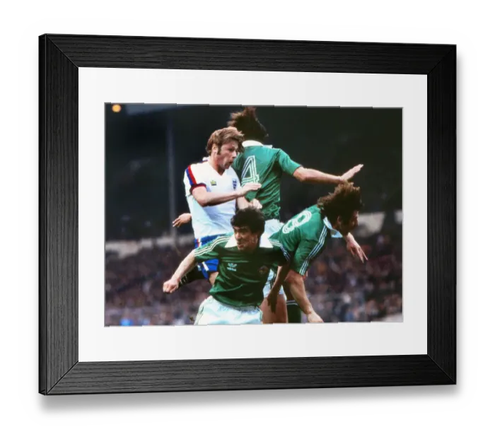 Framed Print : Englands Brian Greenhoff takes on Northern Ireland - 1978 British Home Championship