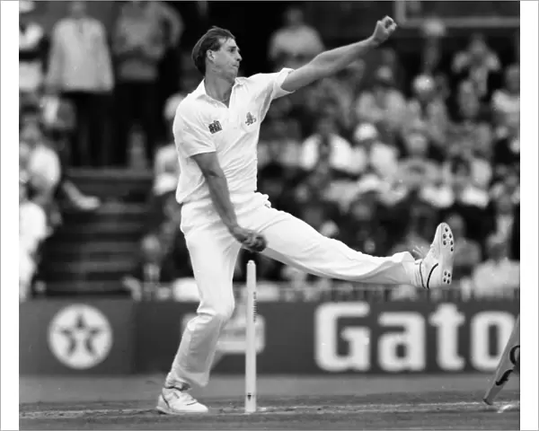 Tim Munton bowls for England