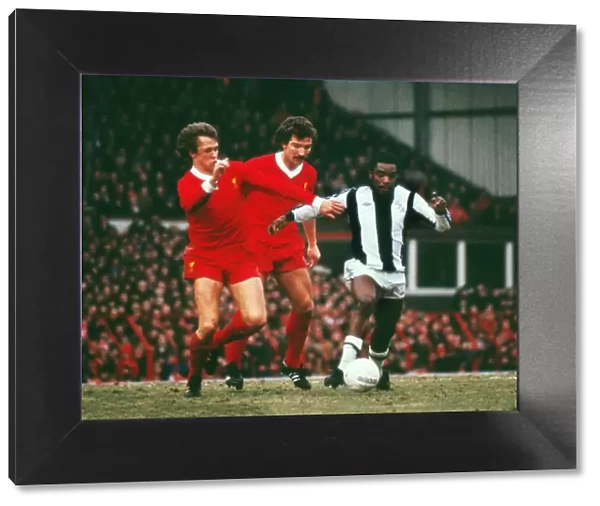 West Broms Laurie Cunningham evades Liverpools Phil Neal and Graeme Souness