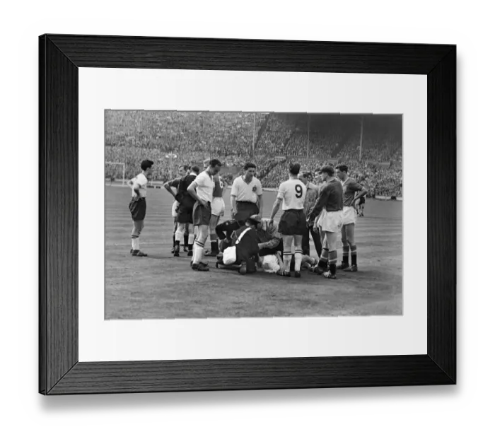 Framed Print : Boltons Dennis Stevens receives medical attention - 1958 FA Cup Final Framed Print : Boltons Dennis Stevens receives medical attention - 1958 FA Cup Final