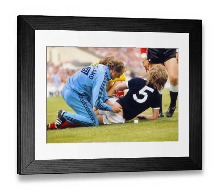 Framed Print : Scotlands Gordon McQueen lies injured - 1977 British Home Championship Framed Print : Scotlands Gordon McQueen lies injured - 1977 British Home Championship