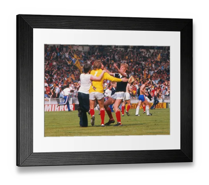 Framed Print : Scotland goalkeeper Alan Rough celebrates with teammate Gordon McQueen after victory at Wembley - 1977 British Home Championship Framed Print : Scotland goalkeeper Alan Rough celebrates with teammate Gordon McQueen after victory at Wembley - 1977 British Home Championship