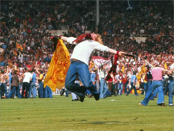 A jubliant Scotland fan during the Wembley pitch invasion - 1977 British Home Championship