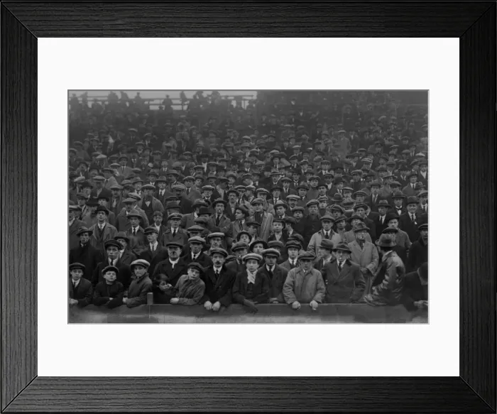 Framed Print : Fans in flat caps in the stands at St Andrews in 1922 Framed Print : Fans in flat caps in the stands at St Andrews in 1922