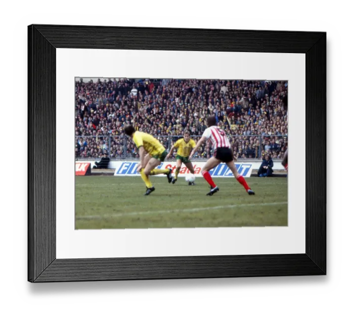 Framed Print : Asa Hartfords shot deflects off Gordon Chisholm for an own goal - 1985 League Cup Final