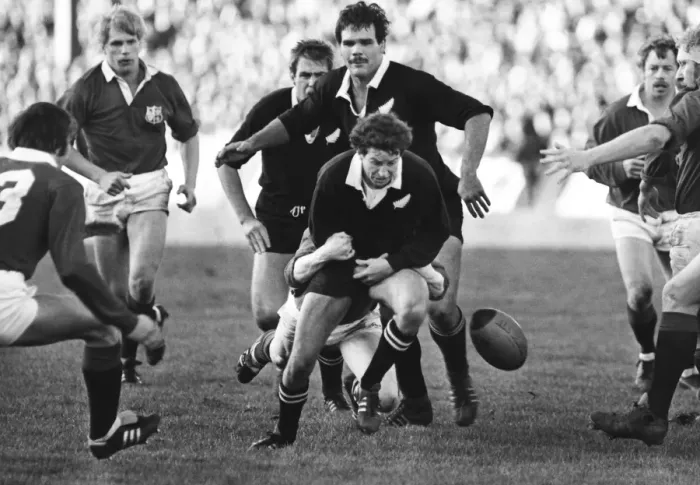 Framed Print : The All Blacks Wayne Smith is tackled during the 2nd Test against the Lions in 1983