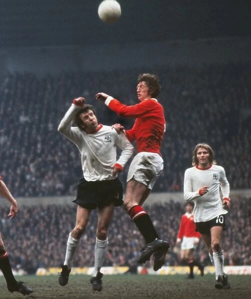 Arnie Sidebottom and Bill Dearden jump for the ball at Old Trafford in 1973