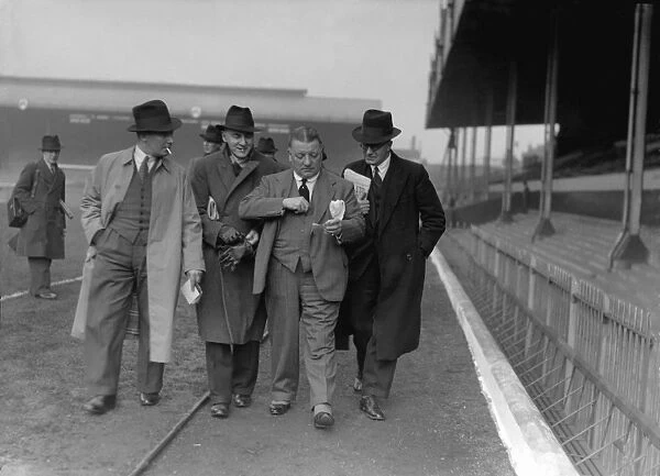 Arsenal manager George Allison talks to the press at Highbury before the 1936 FA Cup Final