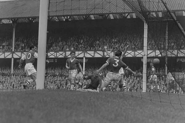 Arsenals Jimmy Bloomfield scores against Everton