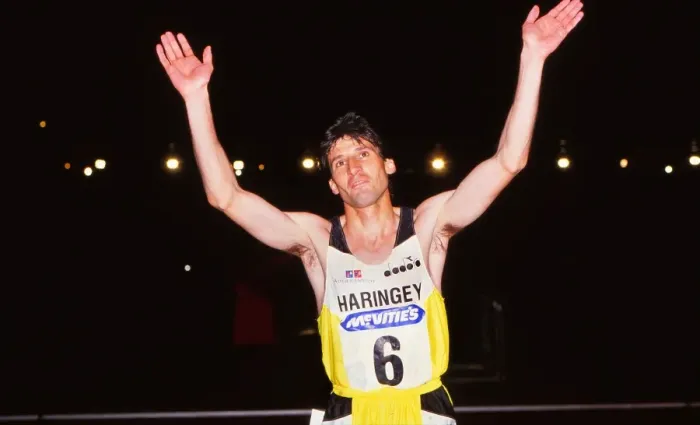 Framed Print : Athletics - McVities meeting at Crystal Palace 1989 - Mens 1500m Sebastian Coe of Great Britain raises his arms to the crowd after running in his last race in the UK before