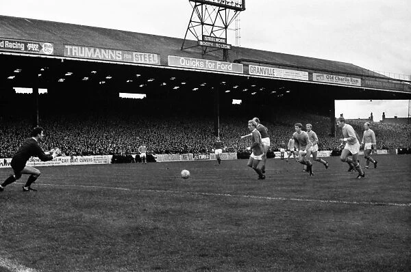 Bobby Charlton scores against Manchester City in 1967